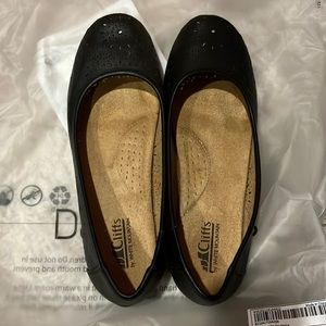Woman’s black flats